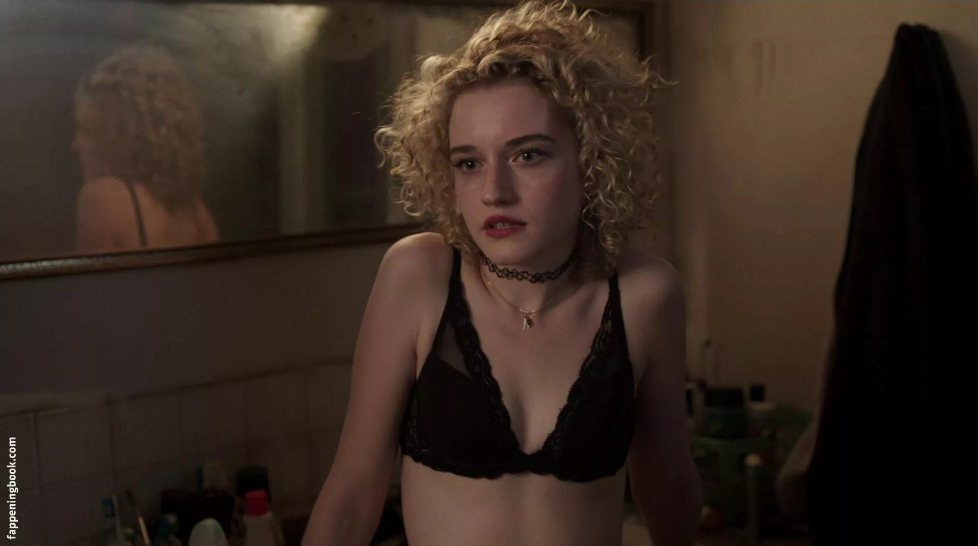 Julia Garner in a bra