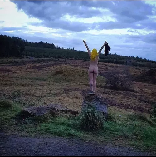 Just she that strips off naked outside?