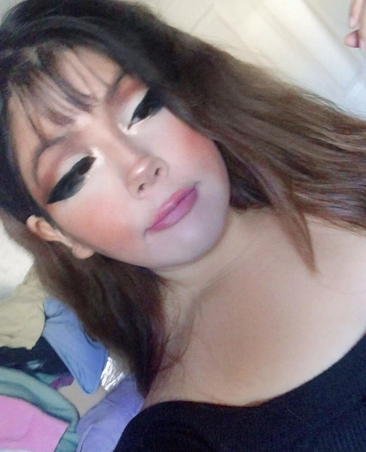 kiiinda sad but I got ready and I excited to go get christmas presents for all the doggies in my family, no one has cats :l