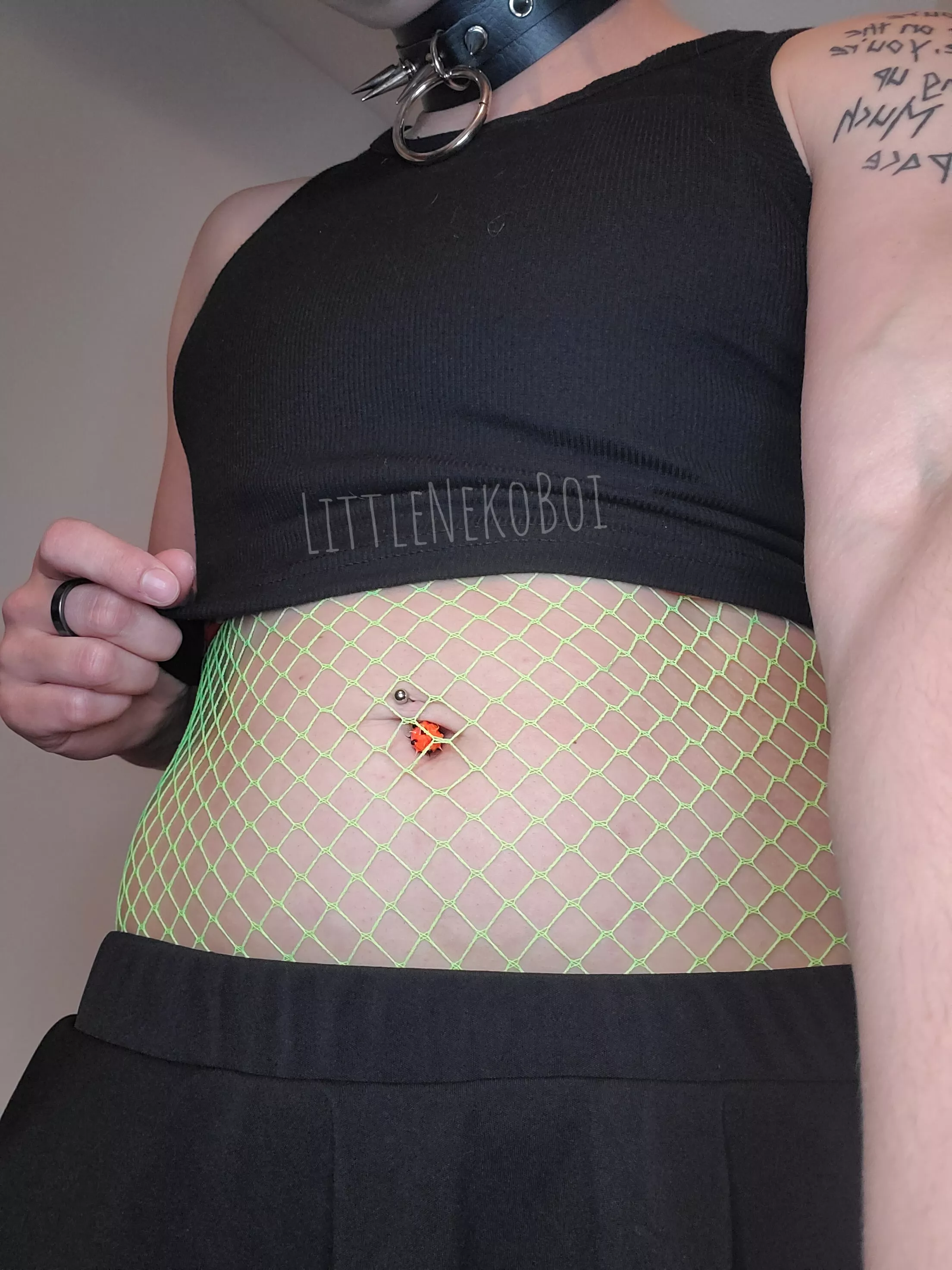 Literally obsessed with bright colored fishnets under black clothes ?