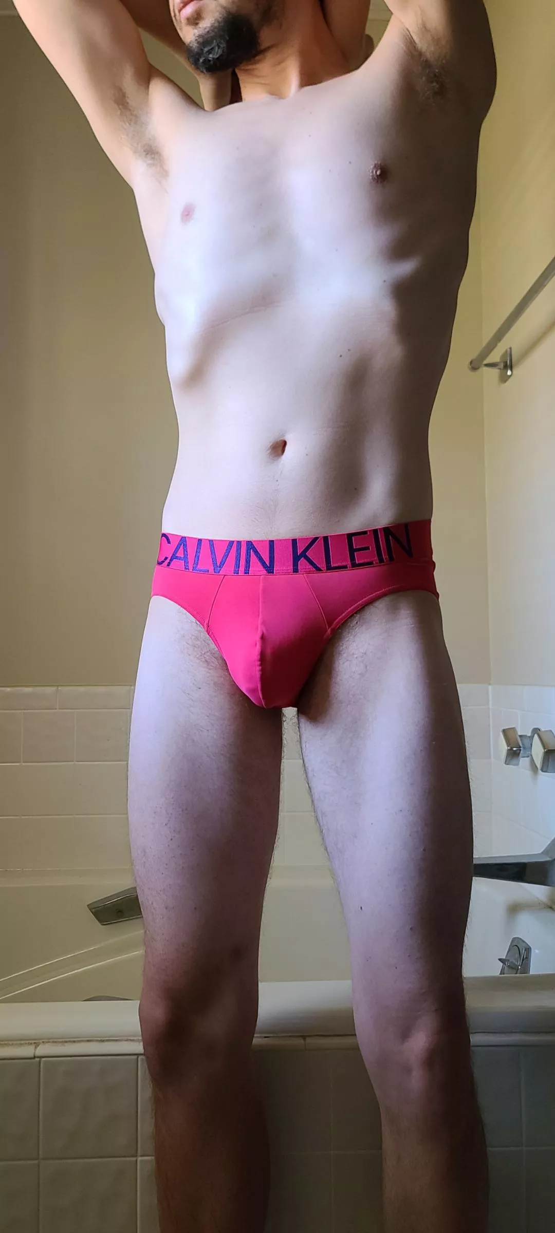 Long legs in pink briefs Long legs in pink briefs