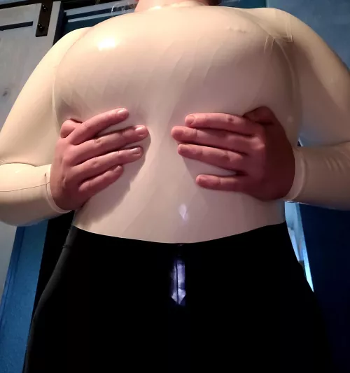 Love the feeling of fishnets under latex!