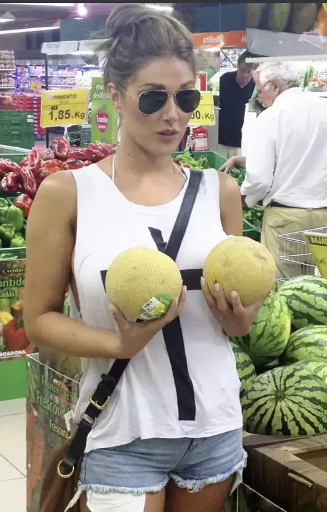 Lucy holding her melons