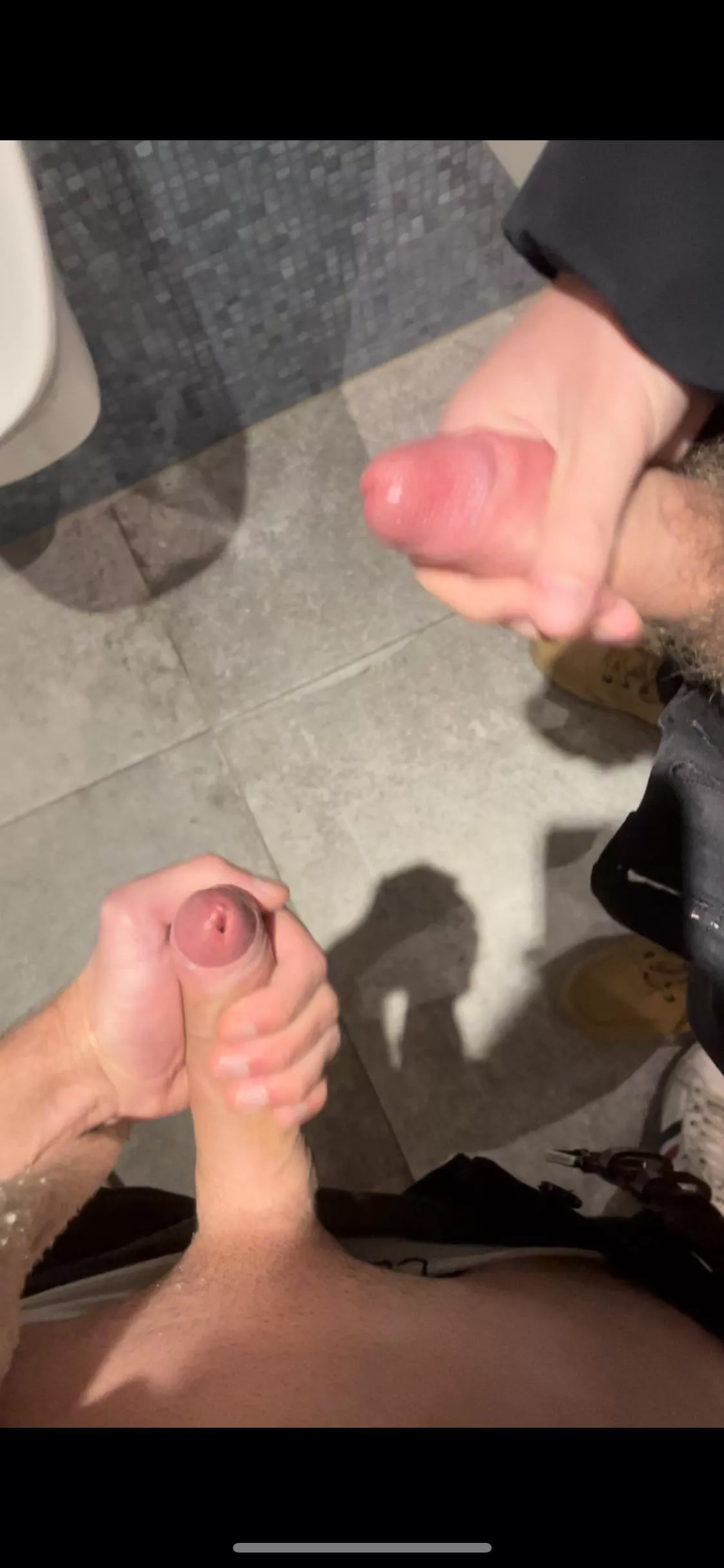 Me and a young twink jerking in a public restroom in Berlin