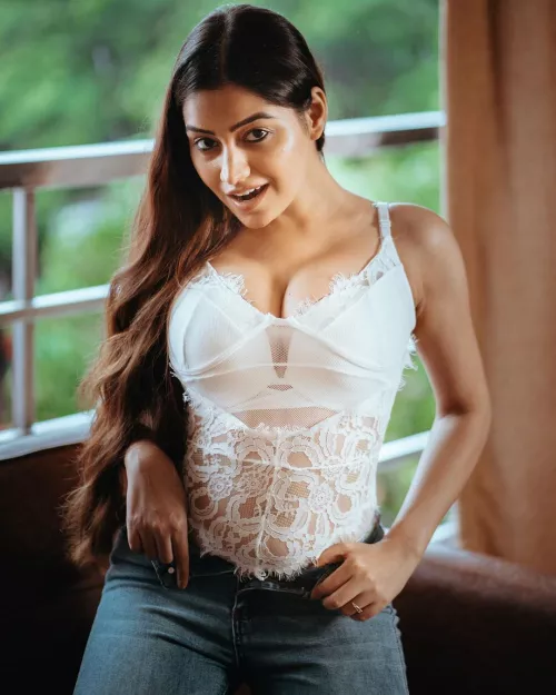 Model in Lingerie outfit and jeans