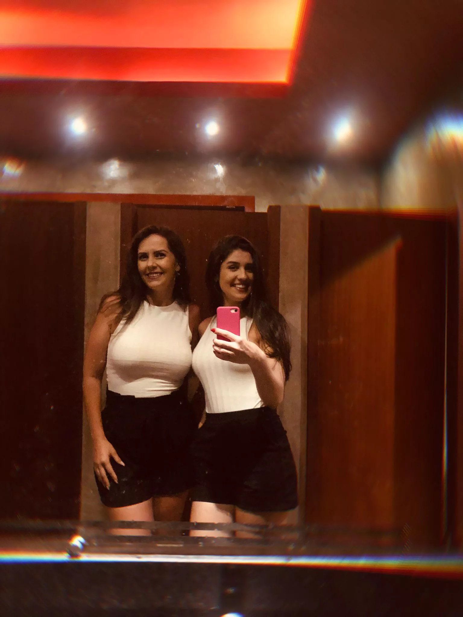 Mother (left) and daughter with same clothes Mother (left) and daughter with same clothes