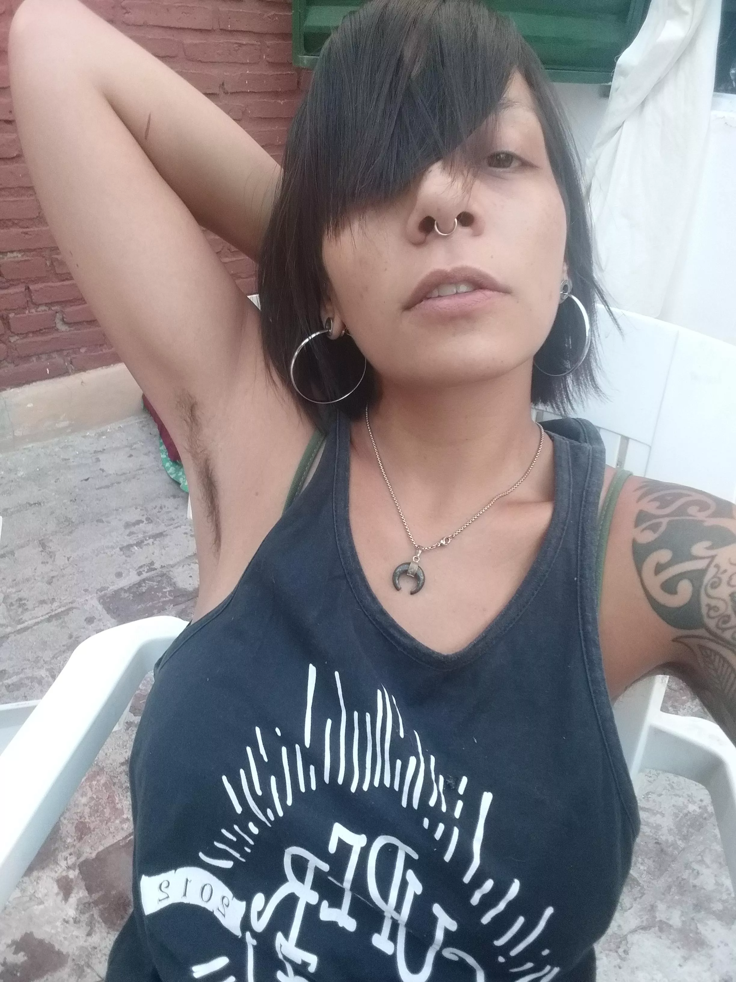 My armpits are vented from the heat of the South American summer.
