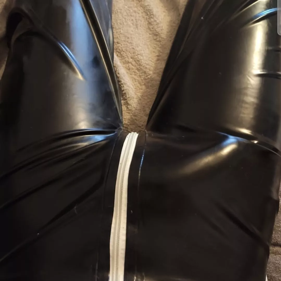 My cock pushing against the tight latex