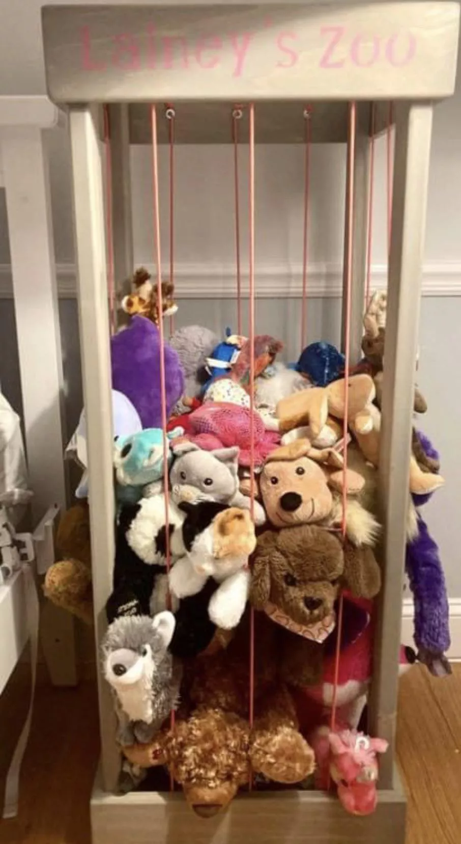 my gym teacher from high school has a woodworking business and he made this stuffed animal zoo 🥺 I want one so bad!!
