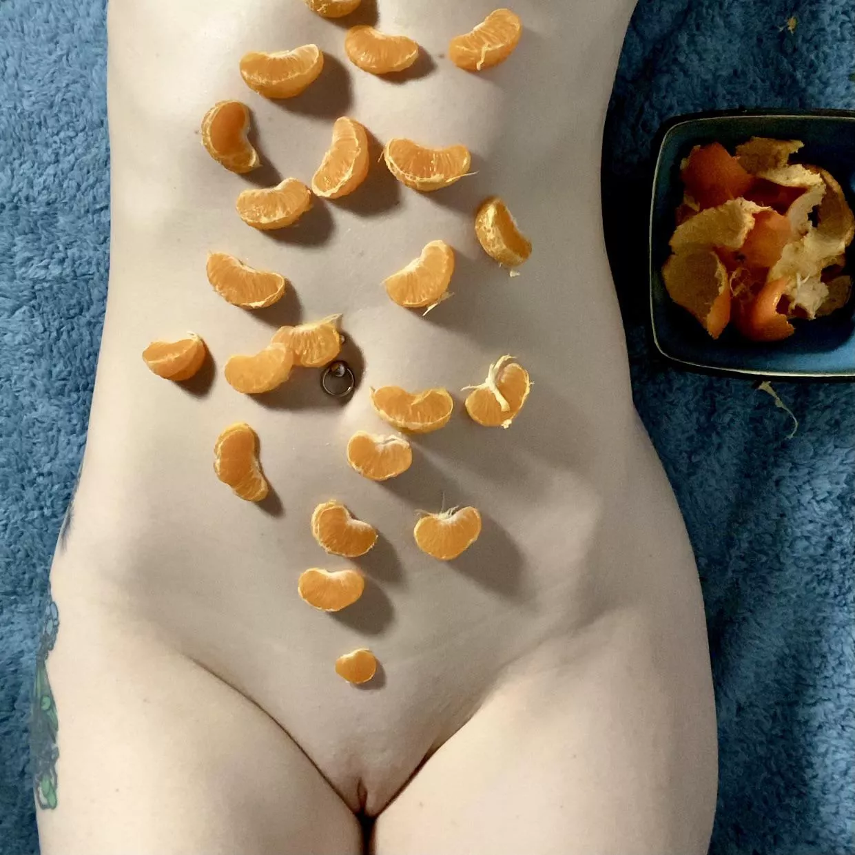 My sexy tummy doubles as a snack table