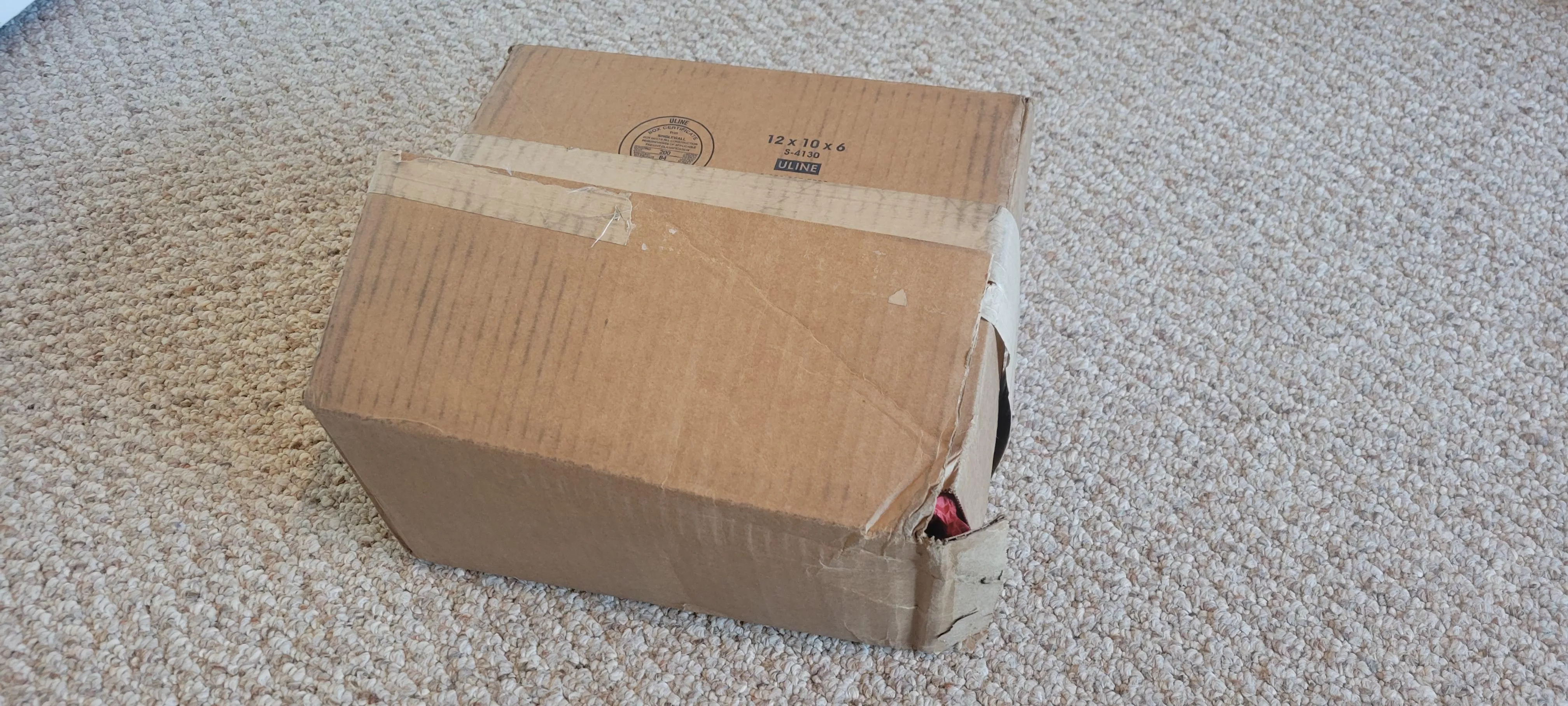 My XL Ika S Flop ordered last Friday arrived today via UPS with the box... half open. I picked it up right after they rang the doorbell. It seems somebody stole the bottle of cum lube. What should I do about this?