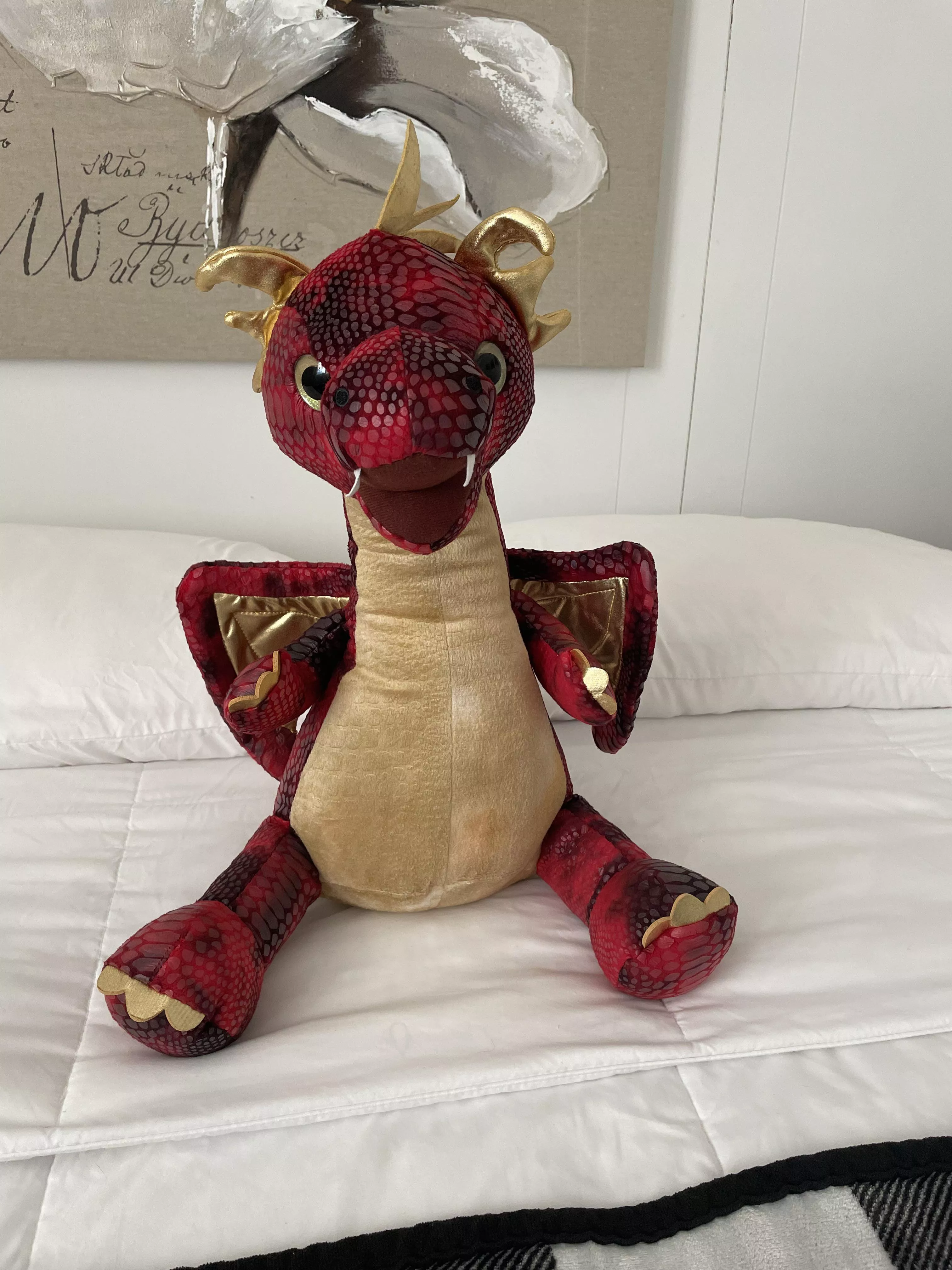 Normally just a DL, but finally got a stuffie and pacifier and loving it. Mr. Dragon is very soft.