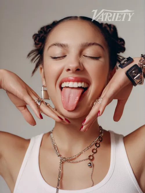 Olivia Rodrigo loves showing off her tongue. Olivia Rodrigo loves showing off her tongue.