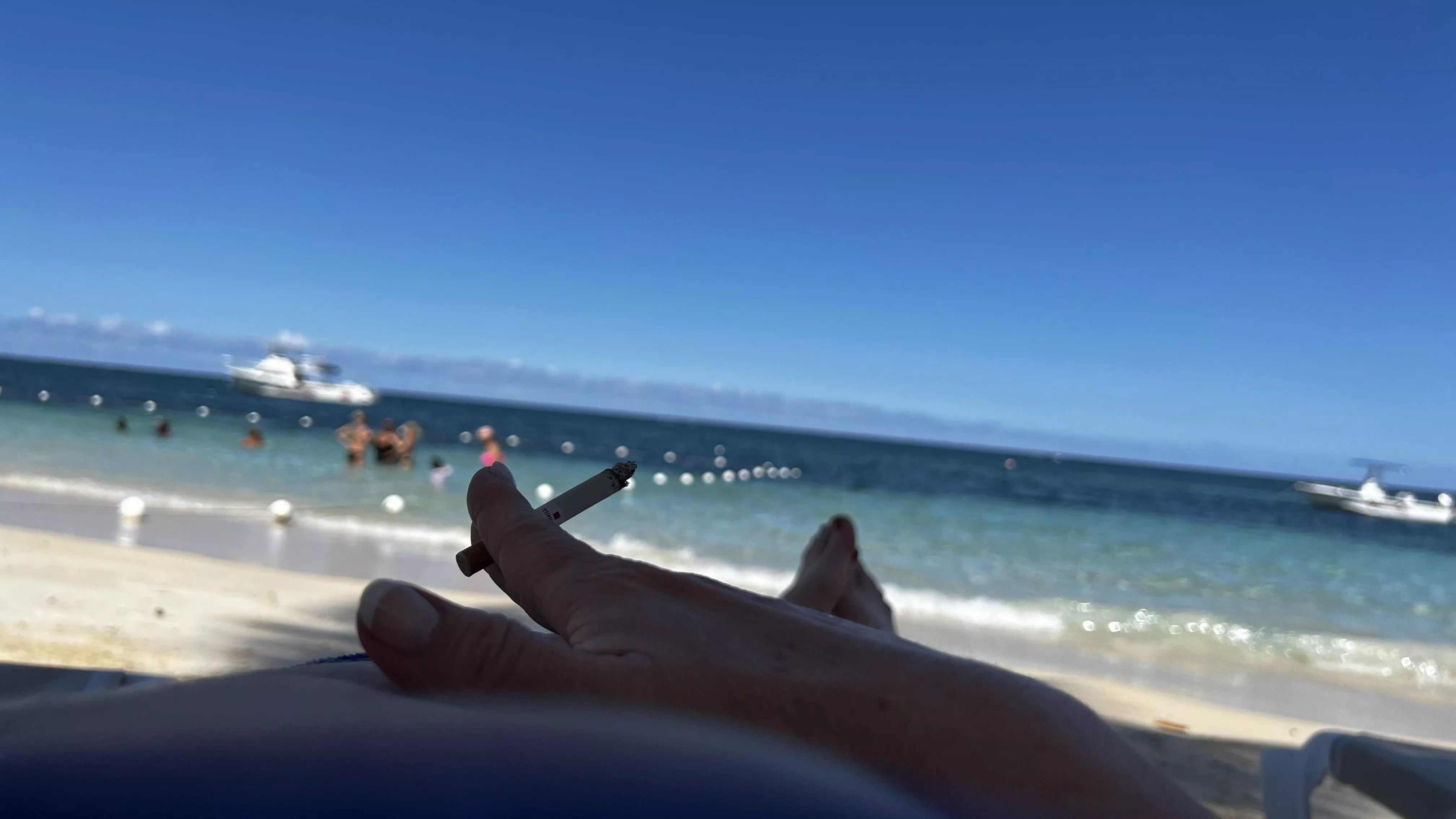 On the beach in Jamaica enjoying a Dunhill!