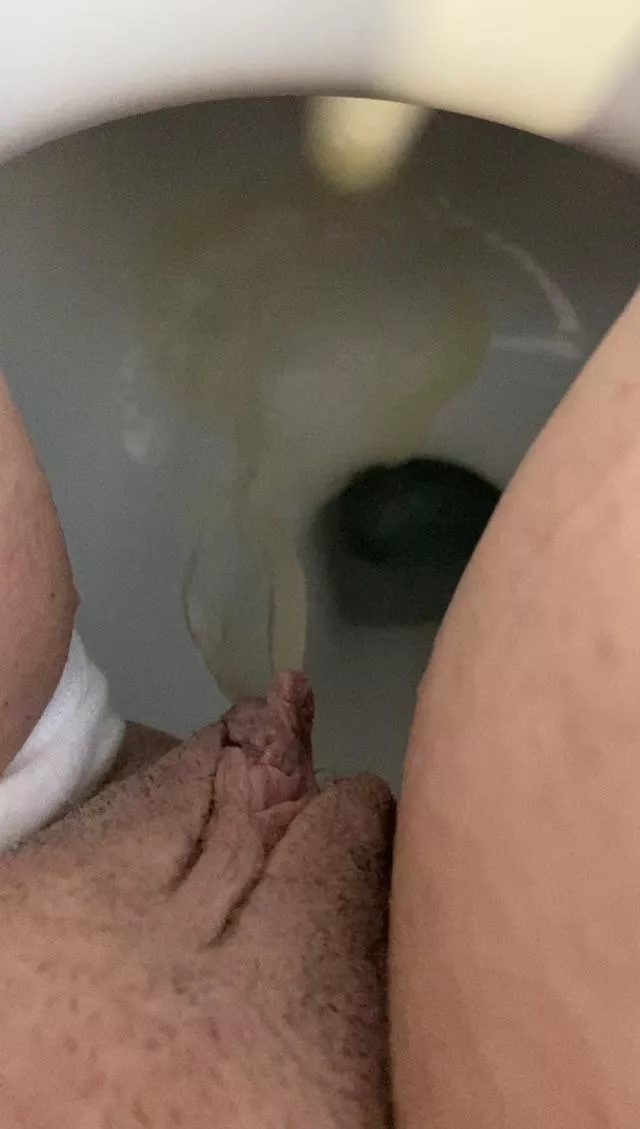 Panties to one side releasing my golden stream into the thirsty toilet