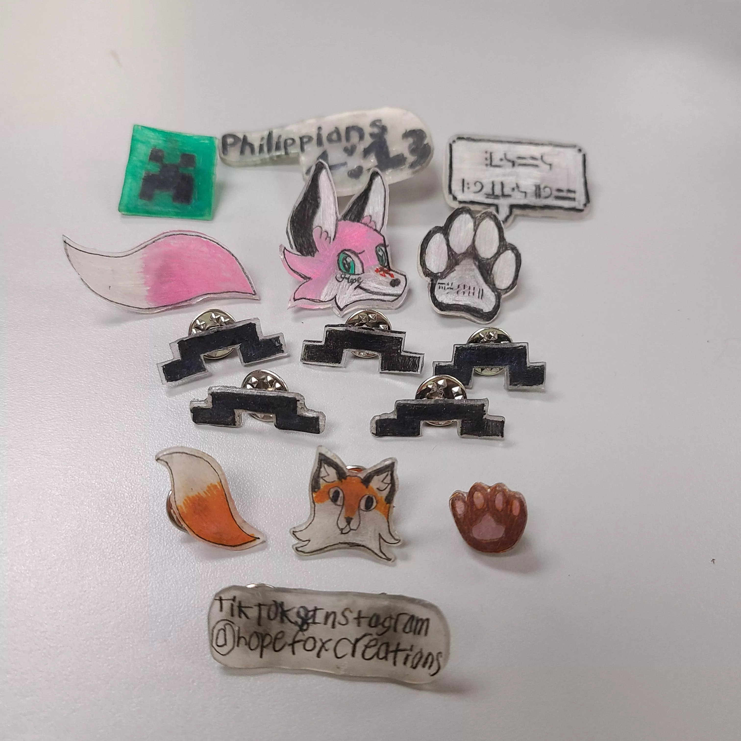Past few days I've been making my own pins out of heat shrink plastic. Hope you like them!