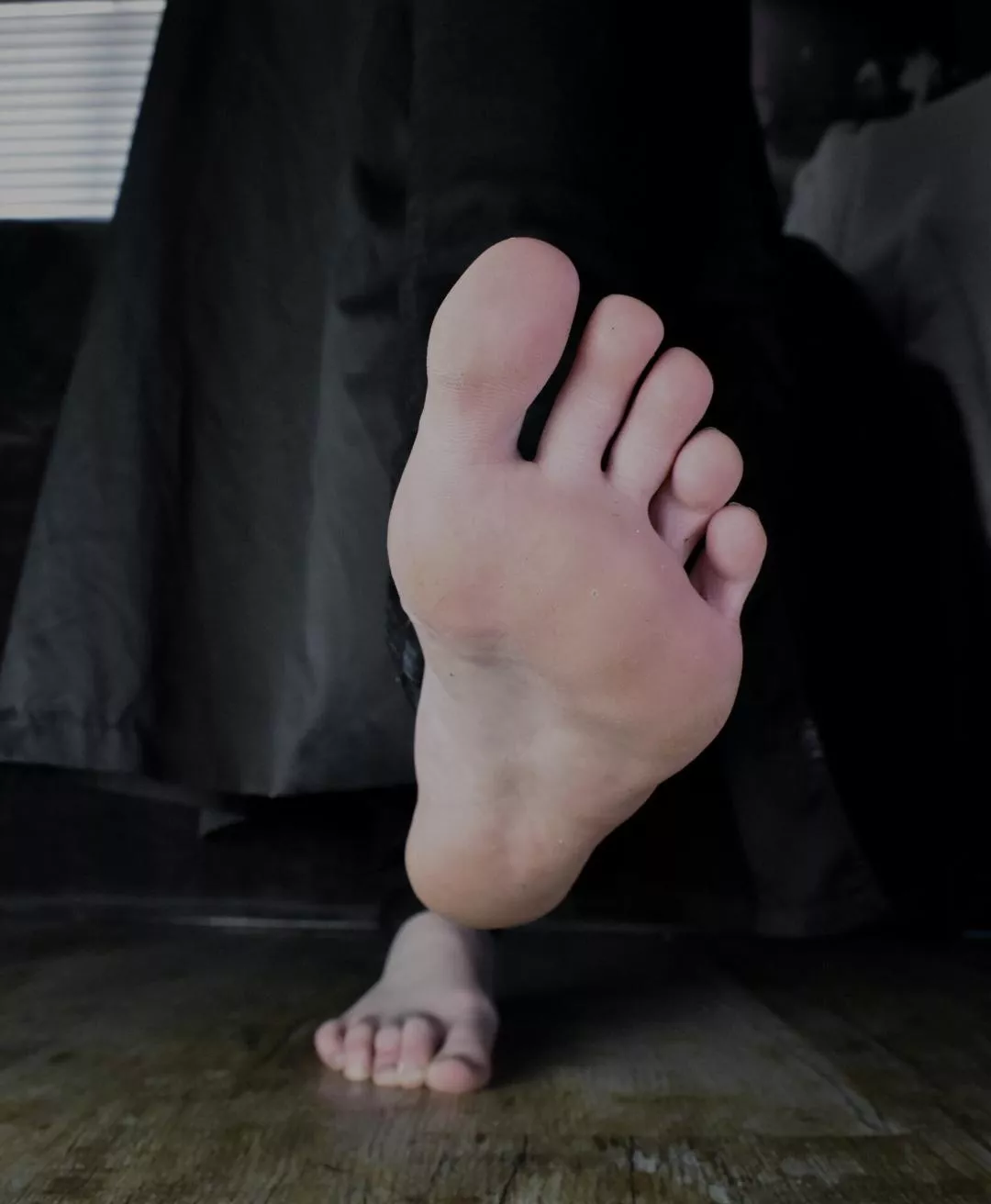 Pervert in a trench coat, fully clothed other than my naked feet