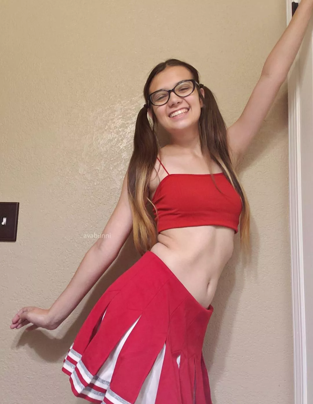 Pigtailed cheer leader at your service