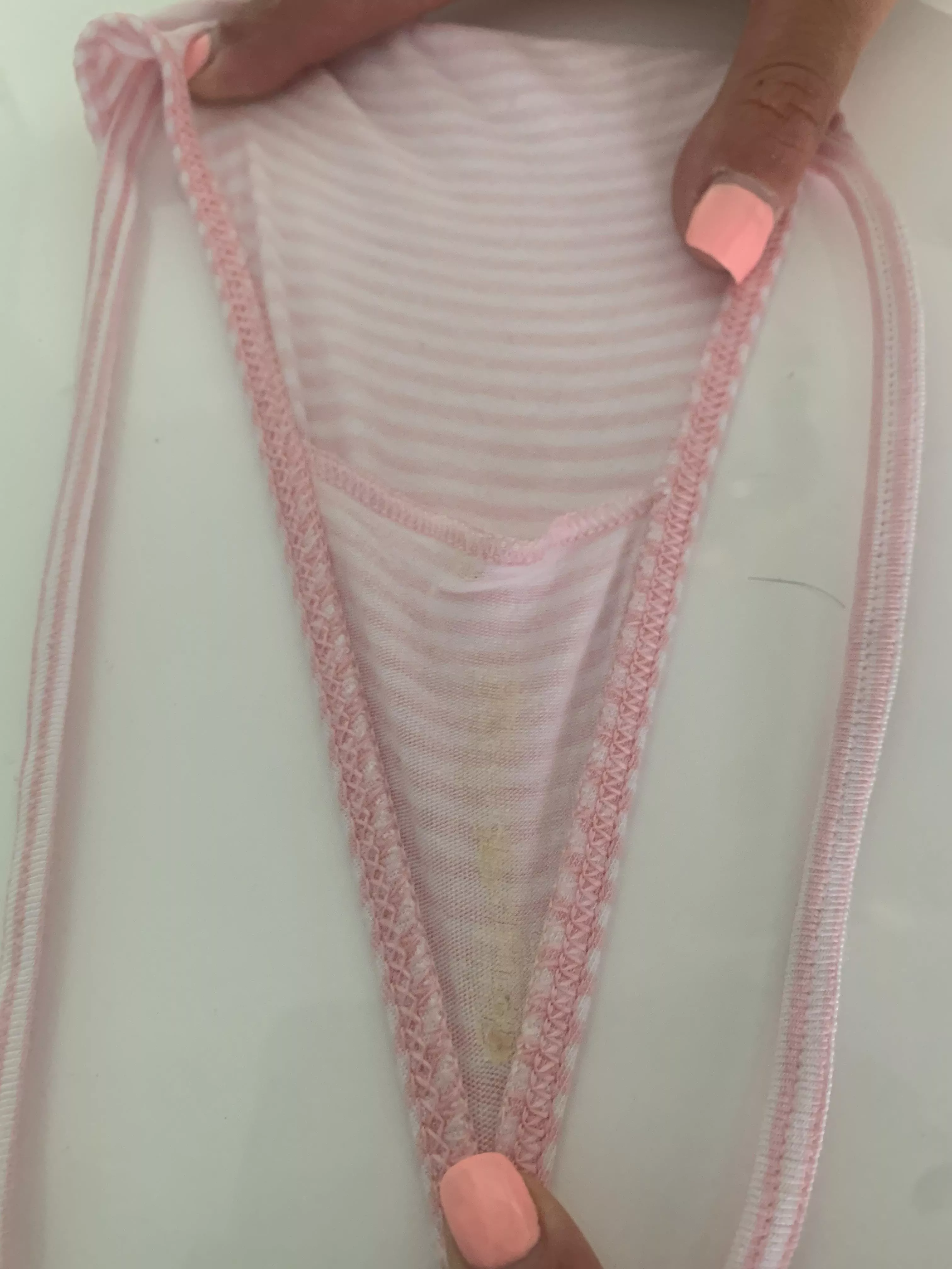 pink and white striped g-string. Crusty and cummy and ready for more 😉