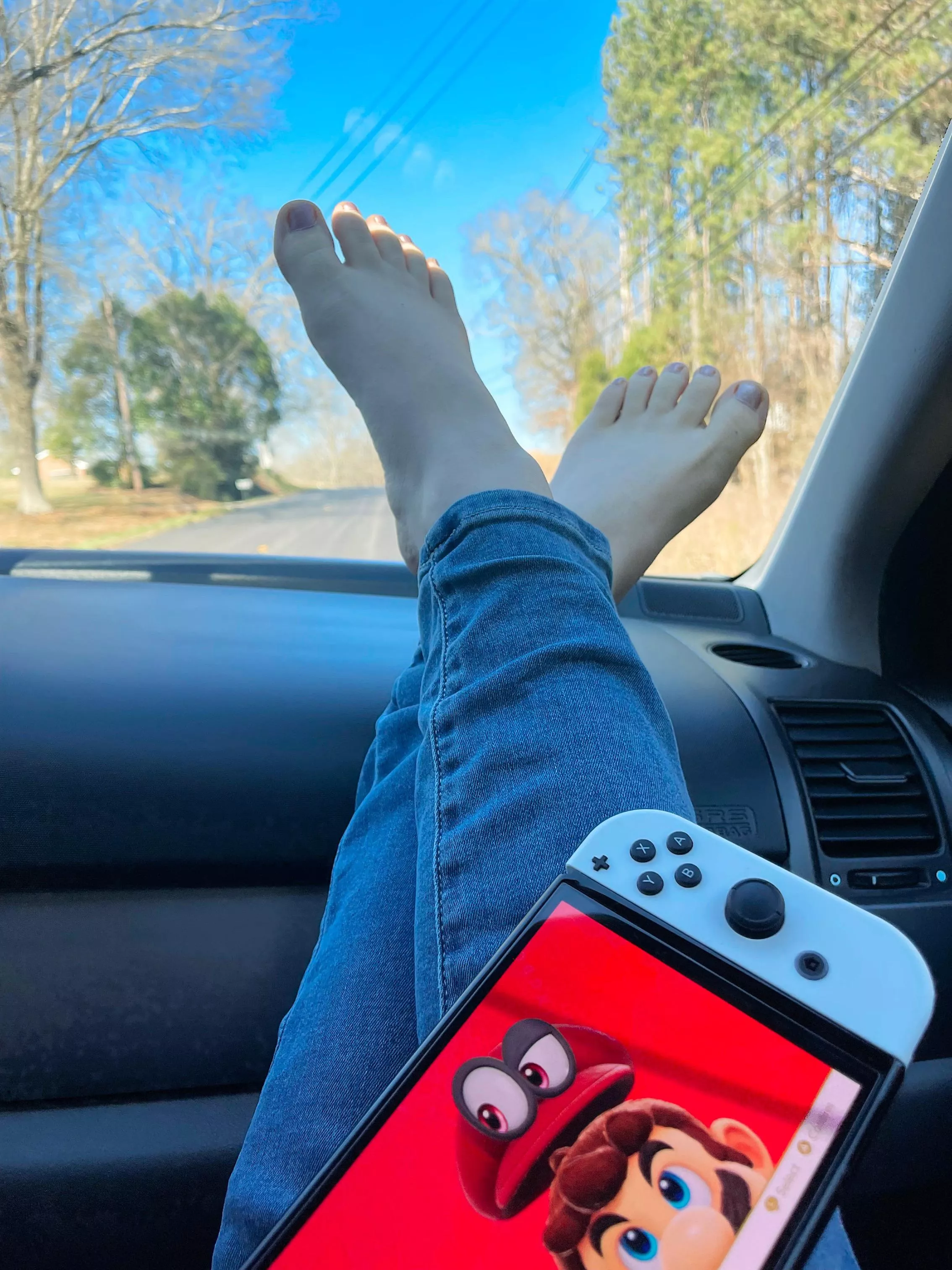Playing Mario odyssey on a road trip. My tiny toes need new polish. What color should paint them?