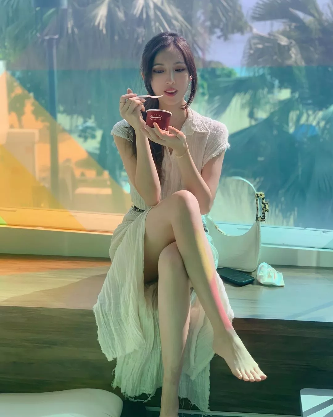 Pretty legs and ice cream Pretty legs and ice cream