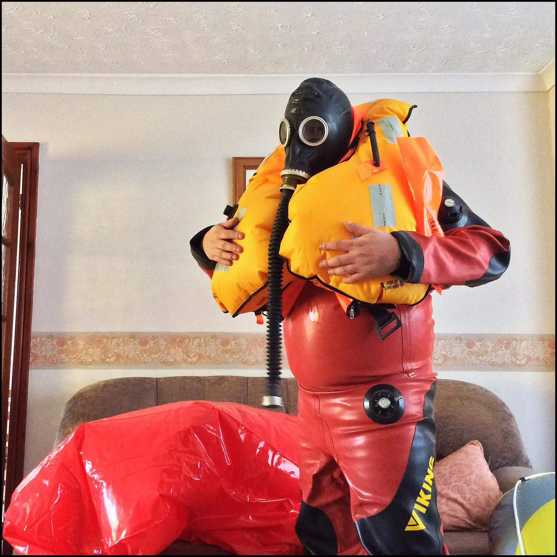 Red n black Viking with Challenger ?? 275 N offshore life jacket.