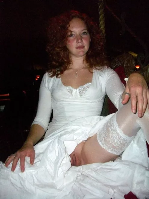 Redhead bride giving us a peek Redhead bride giving us a peek