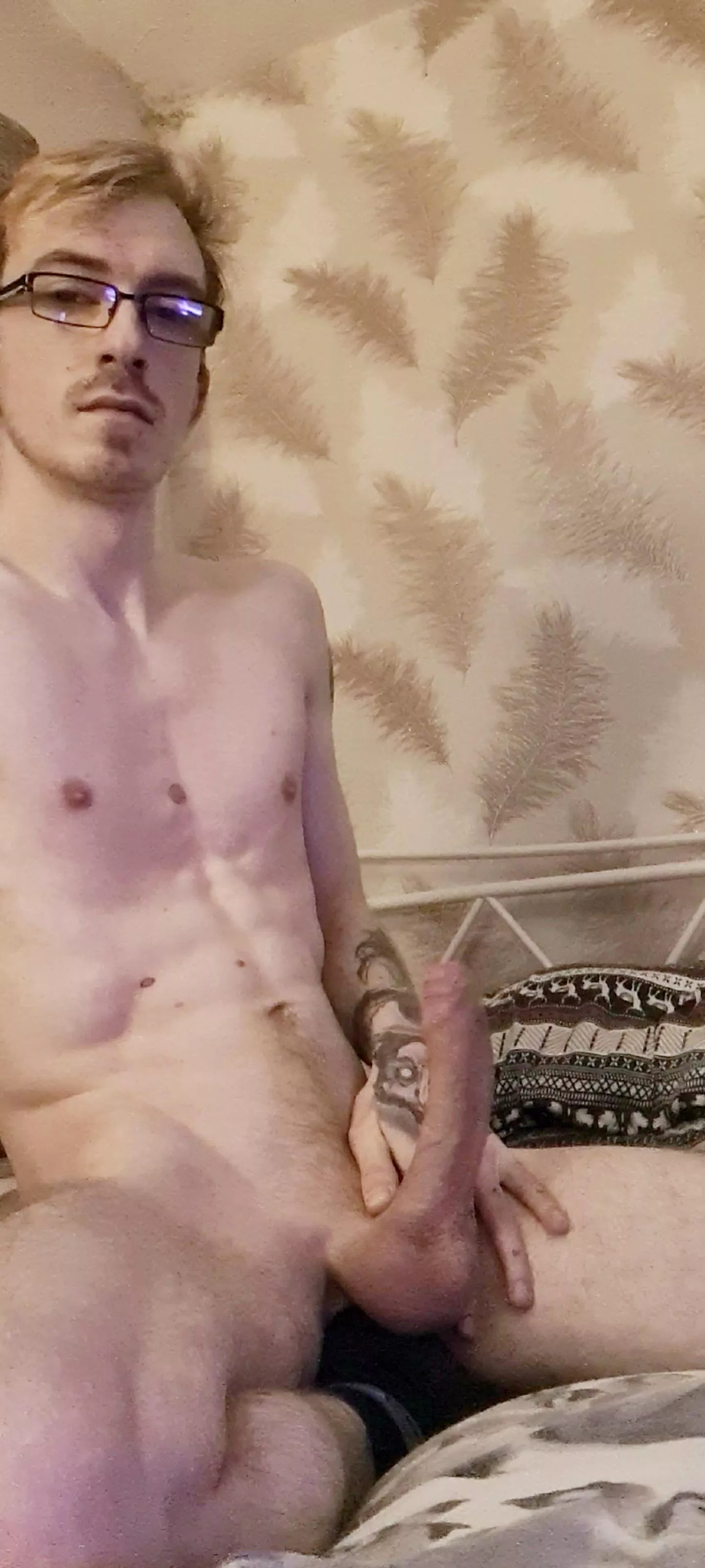 Resting bitch face and a rock hard cock