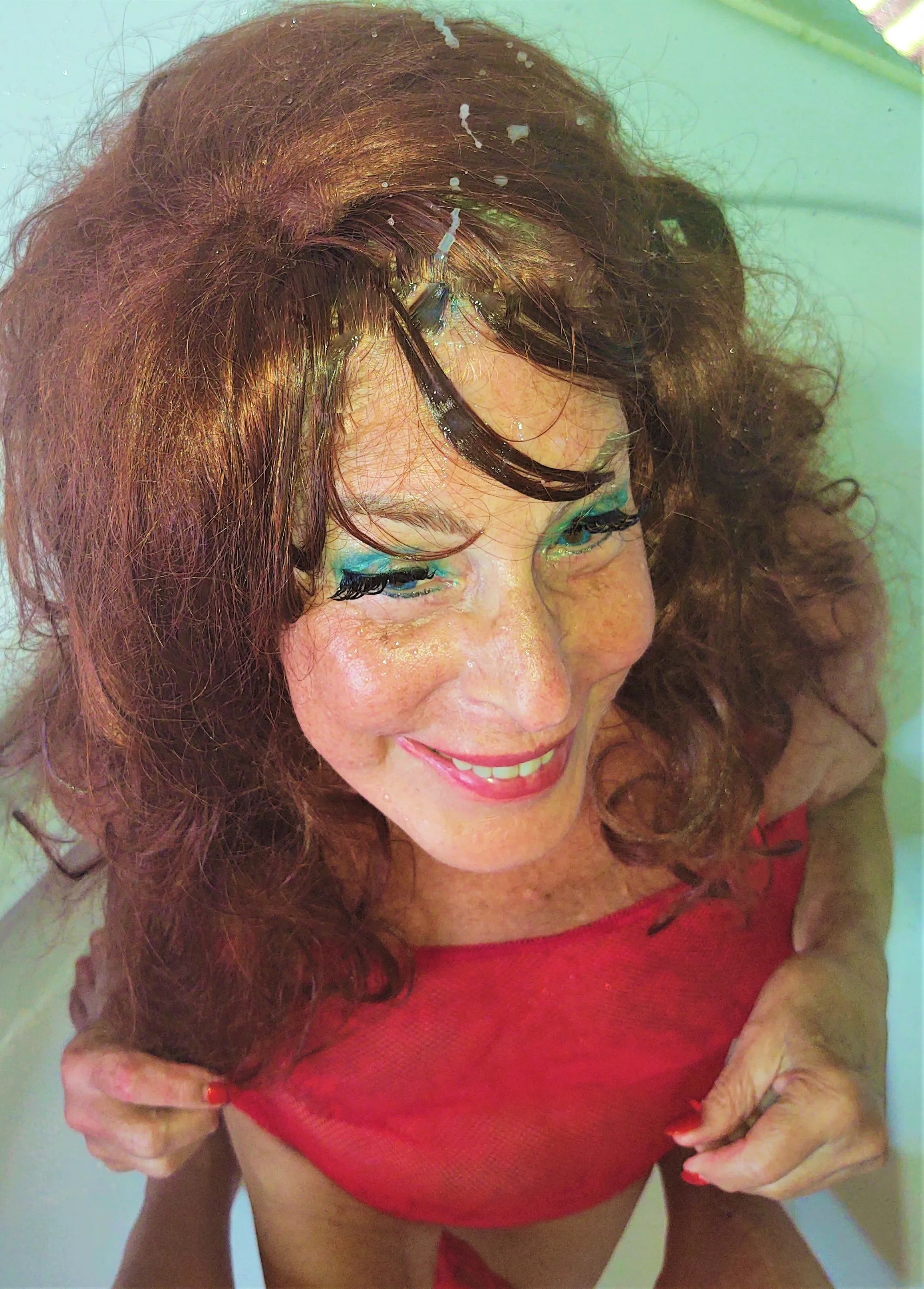 Result of when a guy's cum stream is so strong it shoots over the top of my head and hair with just a few ropes soaking my red hair