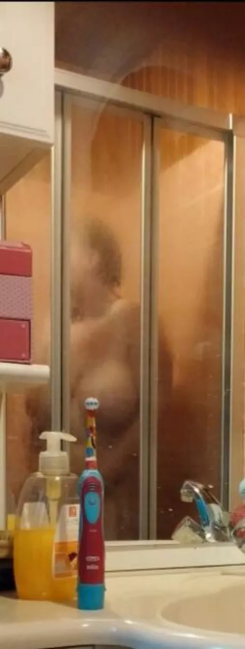 Saw mom in the shower...i tried to get a better pic, but she saw me. Saw mom in the shower...i tried to get a better pic, but she saw me.