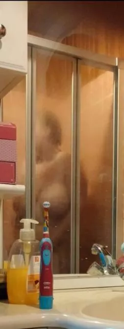 Saw mom in the shower...i tried to get a better pic, but she saw me.