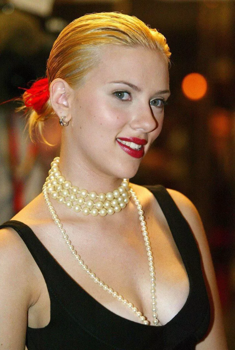 Scarlett Johansson with a pearl necklace.