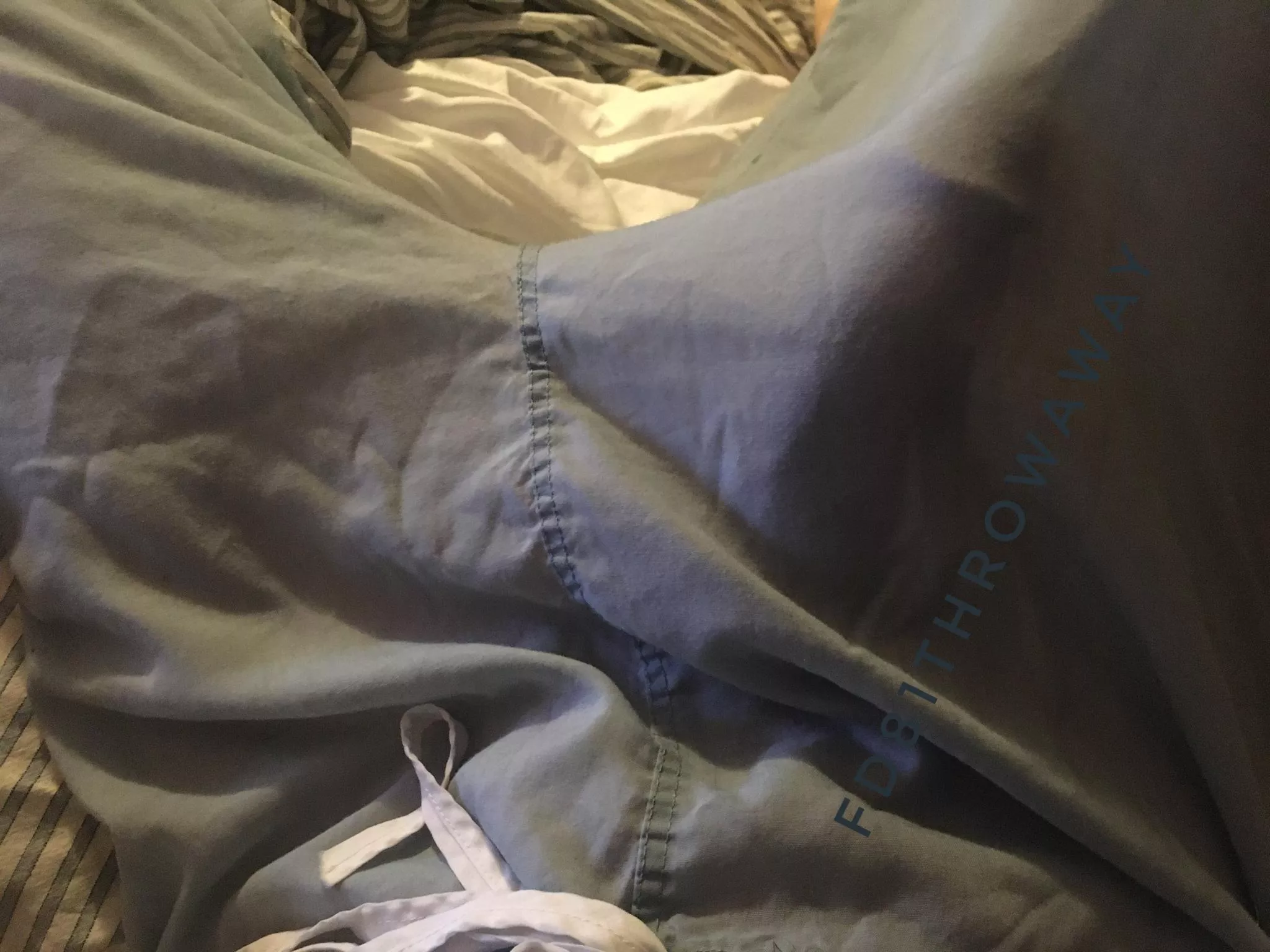 Scrubs show a lil bit of the outline….