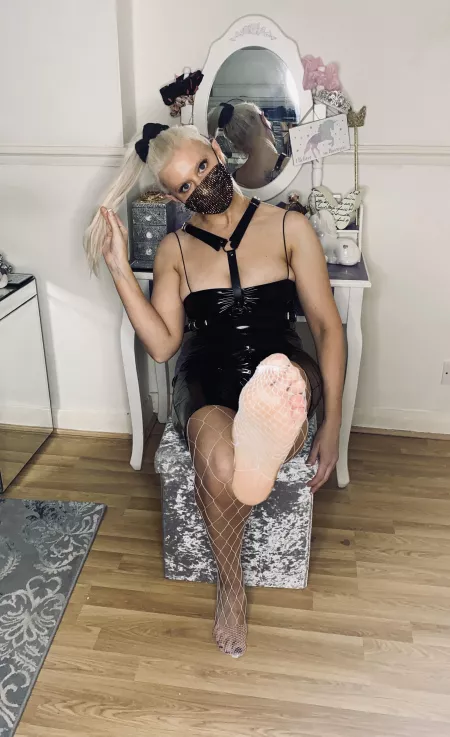 Sexy white fishnets for this little devil