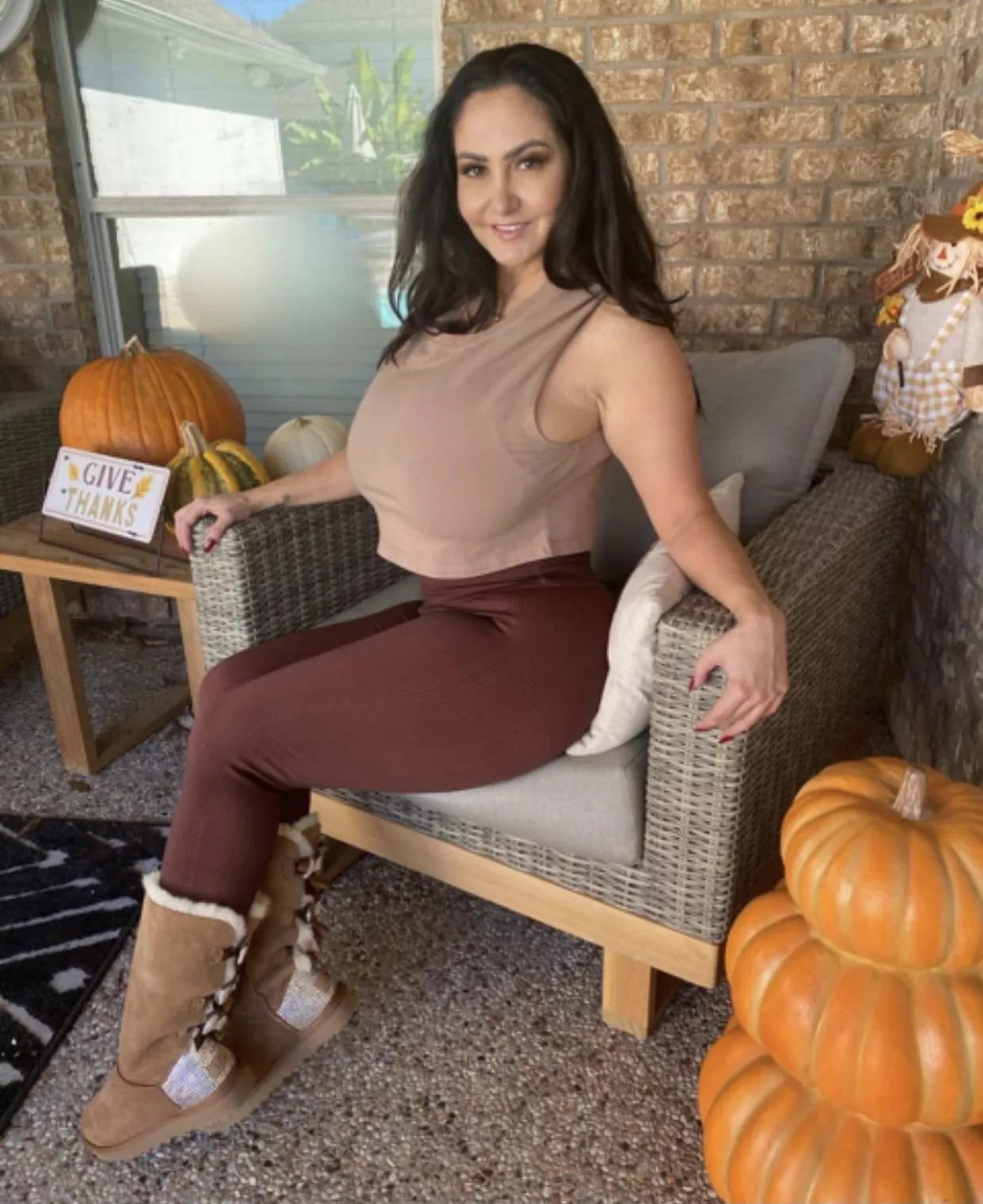 Shes smuggling pumpkins under there ?