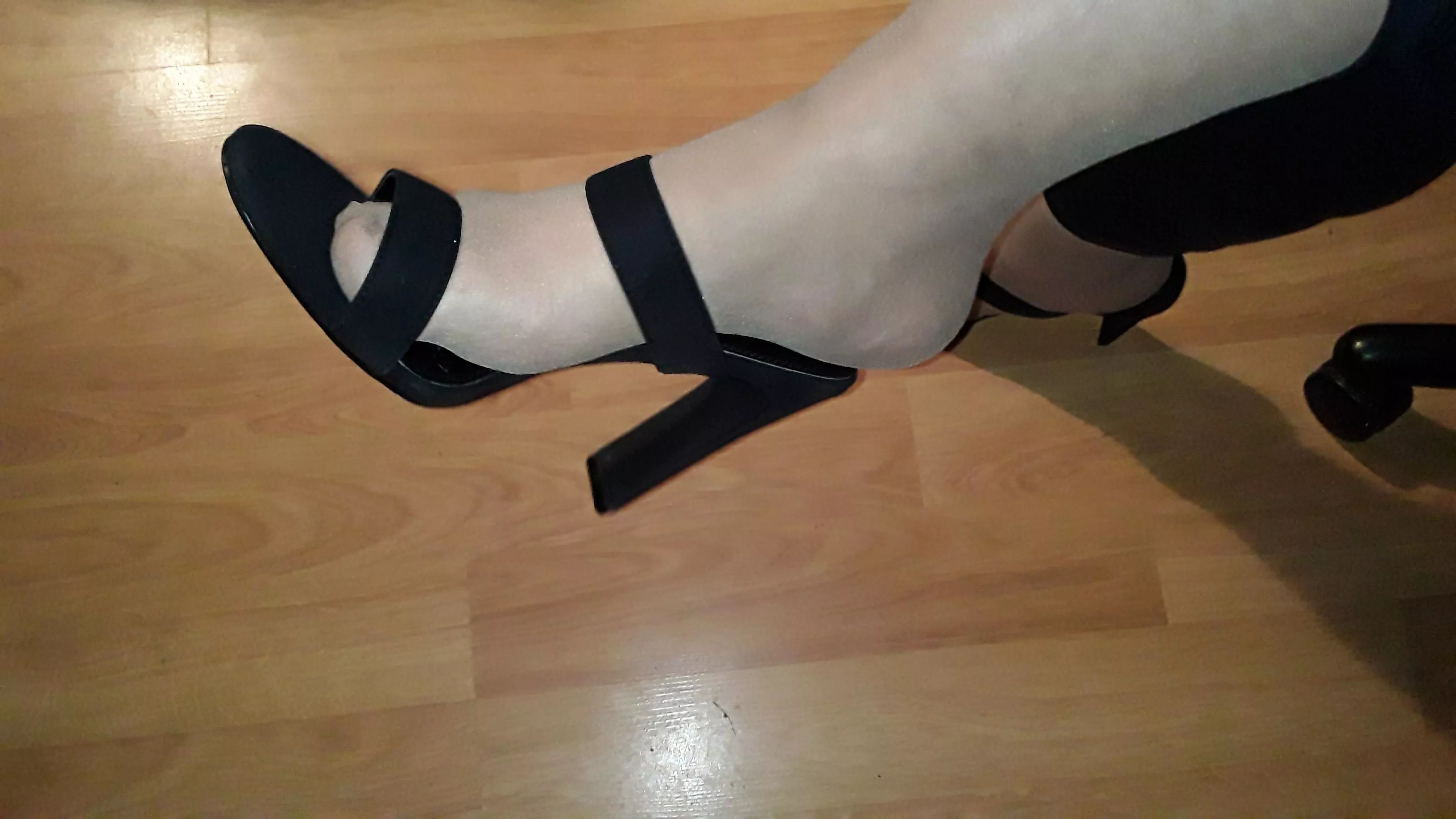 Shiny nylons and a pair of two strap heels... Shiny nylons and a pair of two strap heels...