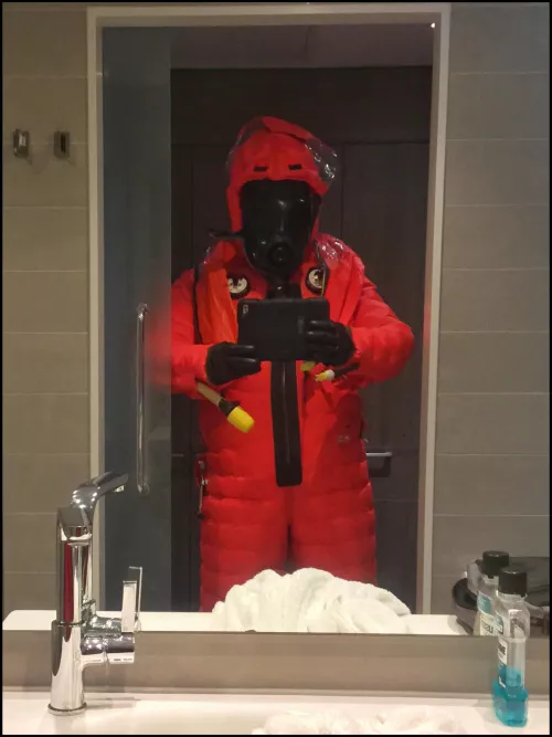 Shuffling around in a very restrictive Submarine Escape Suit…..