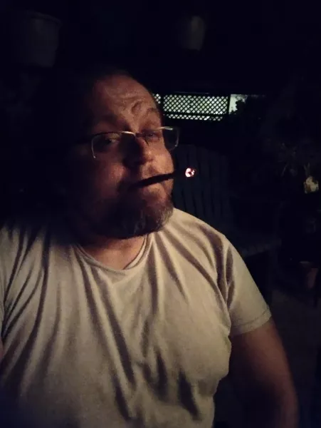 Smoking a blunt Smoking a blunt