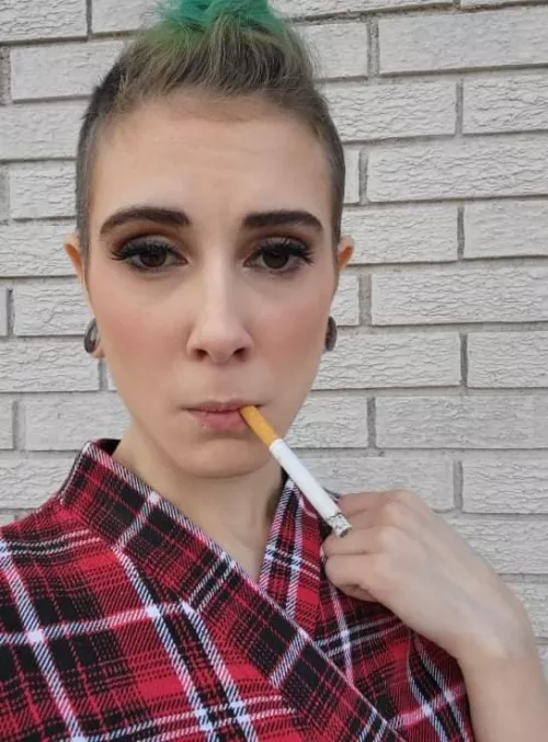 Sneaking a smoke at my friend's wedding while the other bridesmaids get their hair and makeup done 🥰