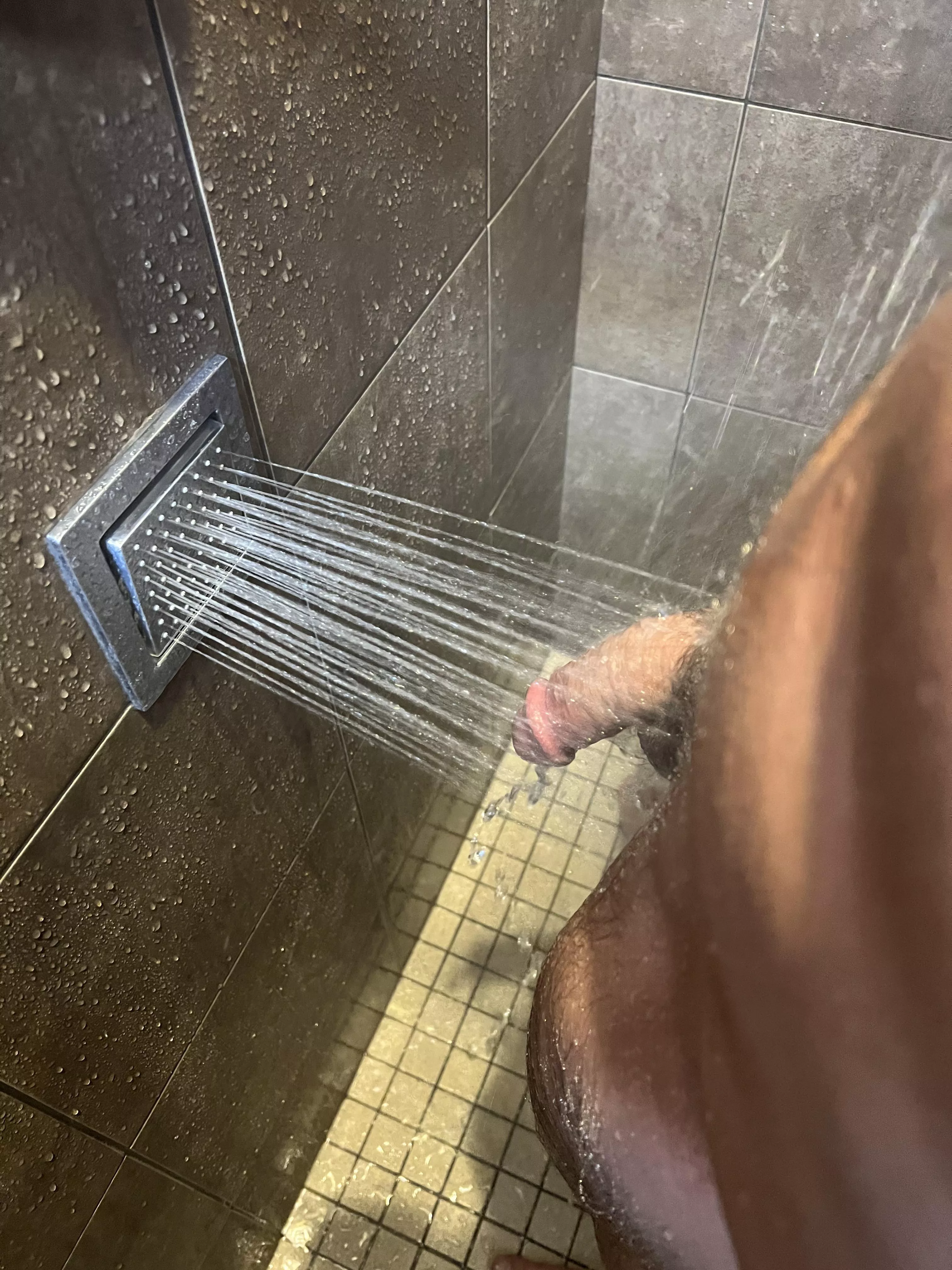 Soft but not for long with this perfectly placed shower head at the gym.