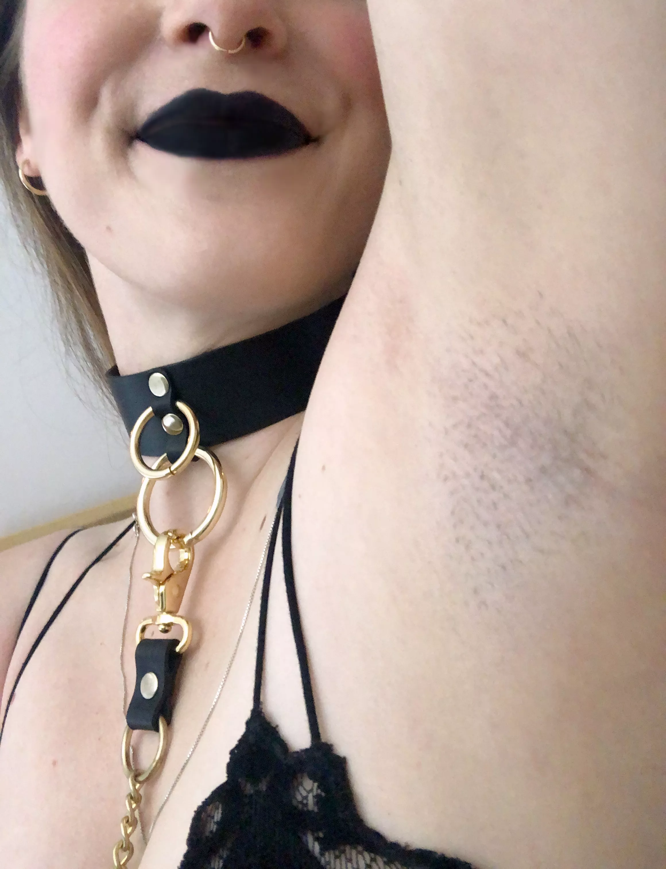 spooky & fuzzy ??goth babe in leather leash & collar ?
