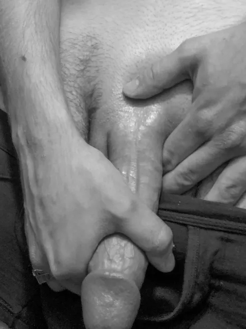 Stroking it till it's rock hard. Anyone want to lend a hand?