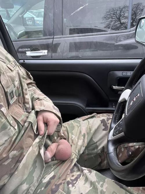 Such a little soldier in the parking lot