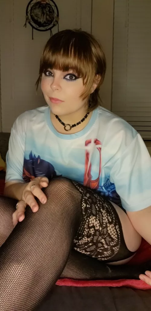 Taking a moment to look at the camera before continuing my anime.