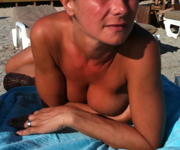 Tanning topless on the french riviera, showing my wedding ring as so many guyz were looking at me ;-)