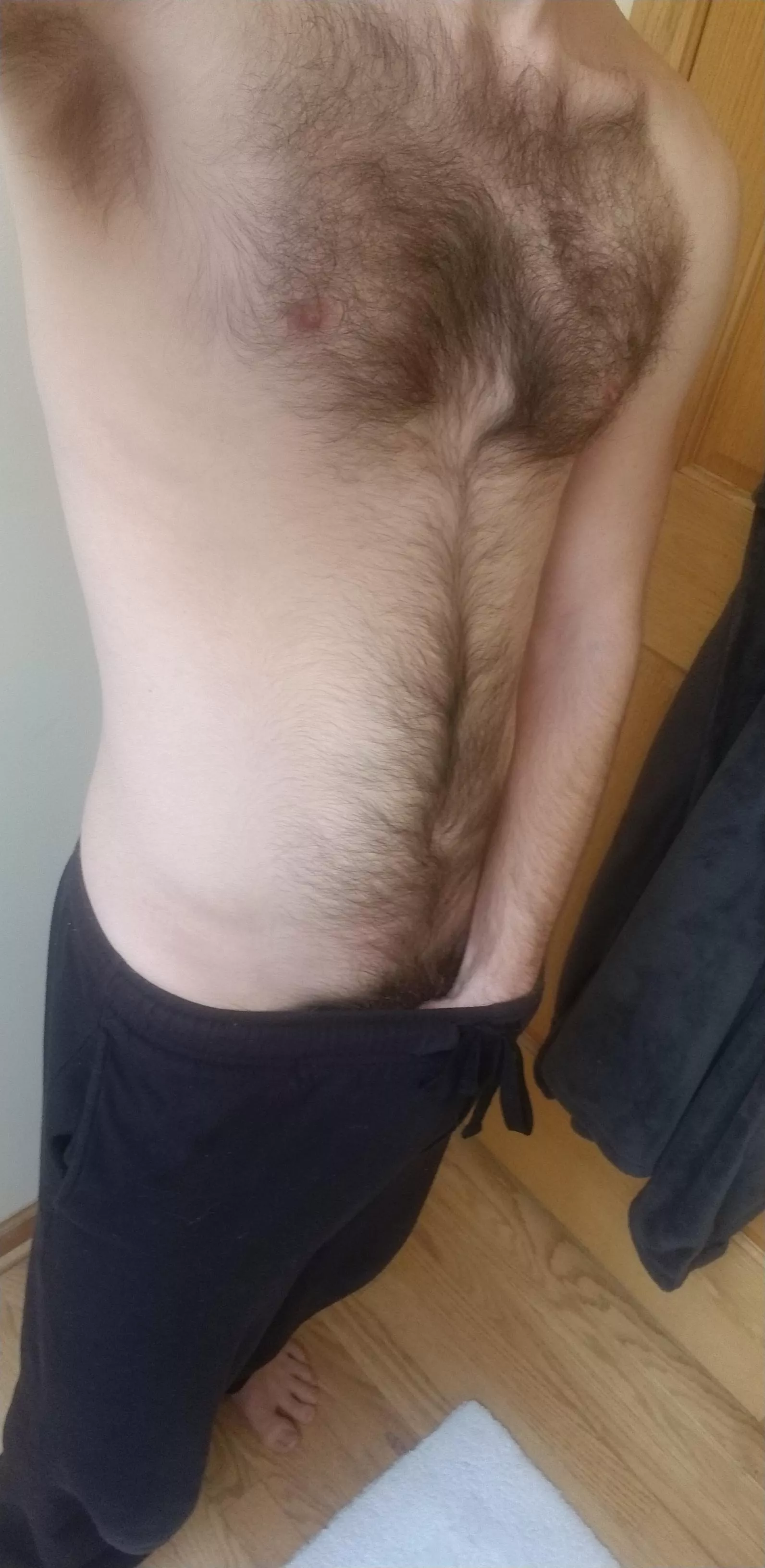 Tease me. Slowly slip your hand down my pants and gently groom your fingers through my bush.