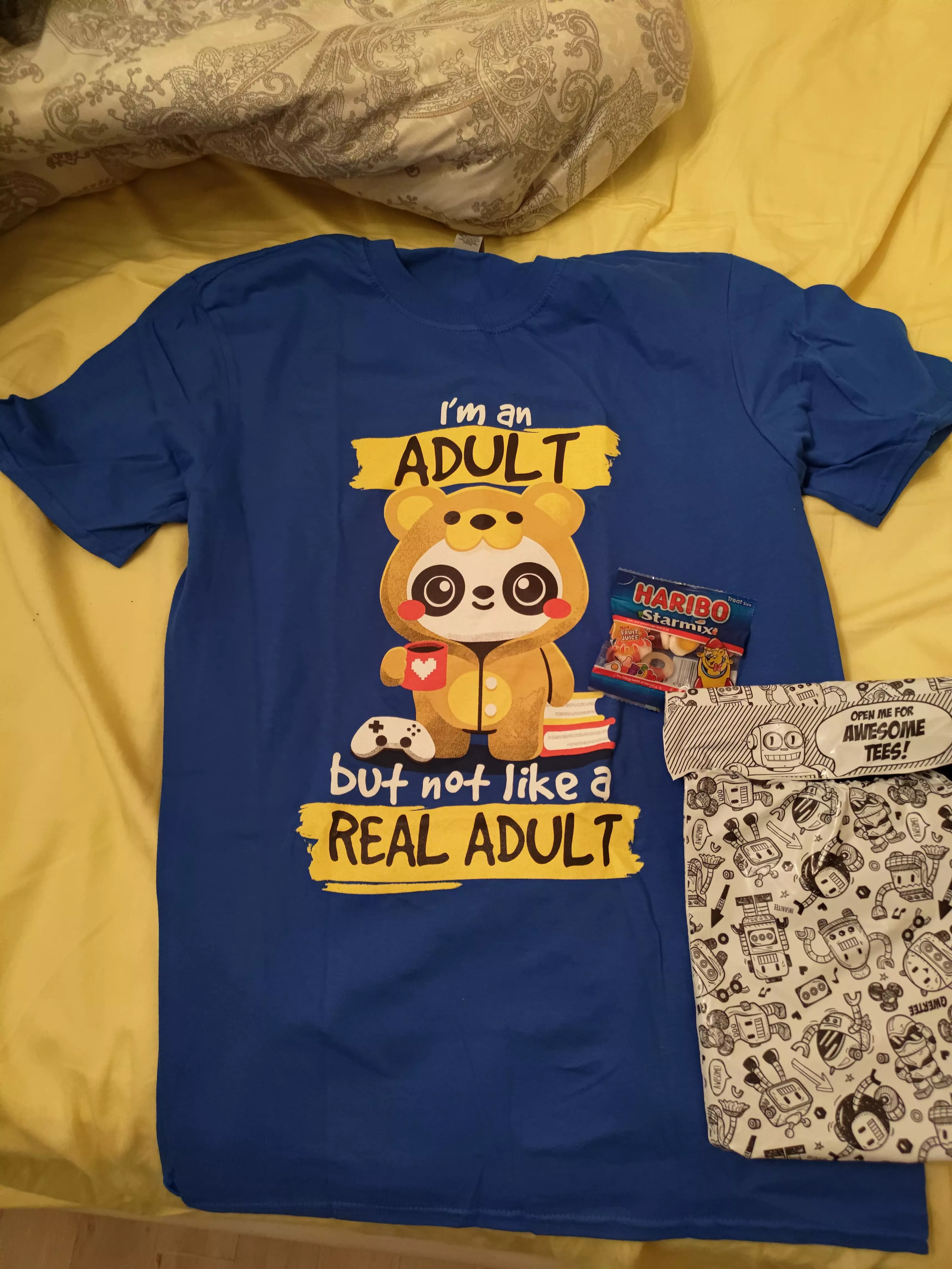 Thanks DaveRox007 for post about this Tshirt. The Qwertee even included Haribo Mix with this shipment. So Cool