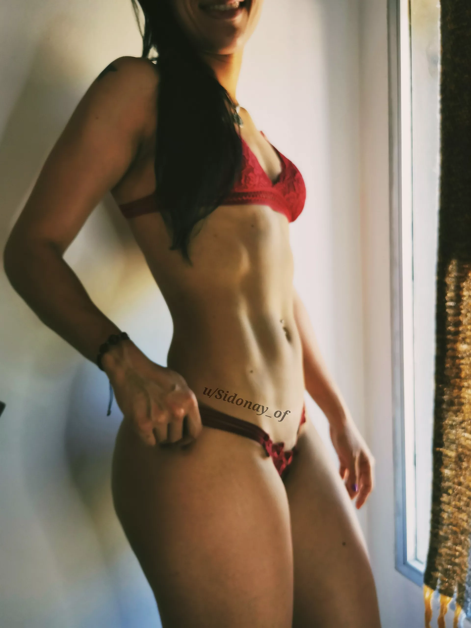 The smile or the tummy?