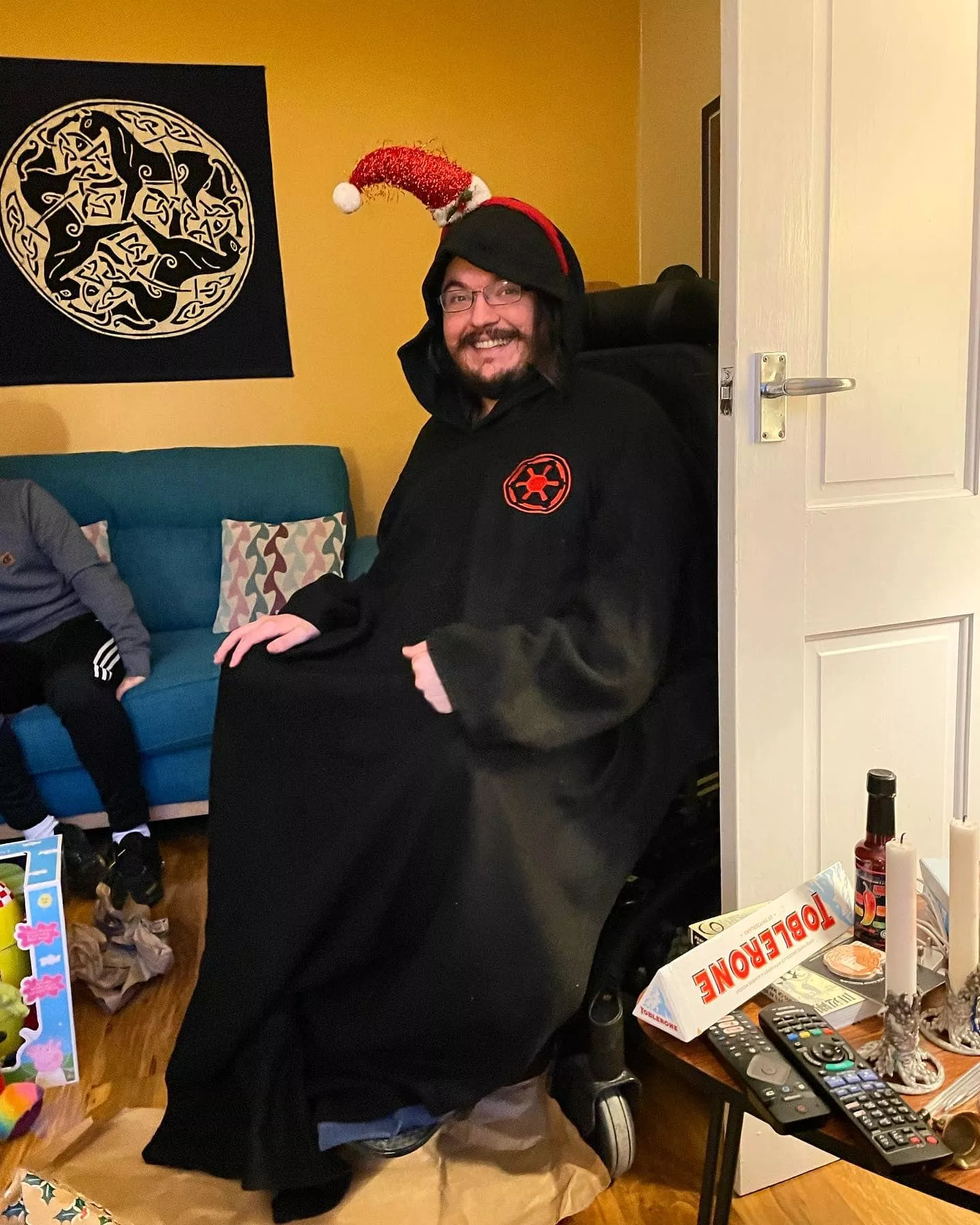 The true meaning of christmas is wearing the obligatory christmas accessory in every photo.