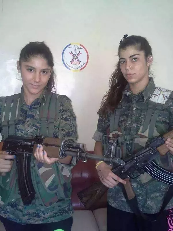 These two Kurdish babes can impose socialism on me anyday!